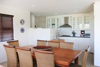 Dining room flowing into kitchen